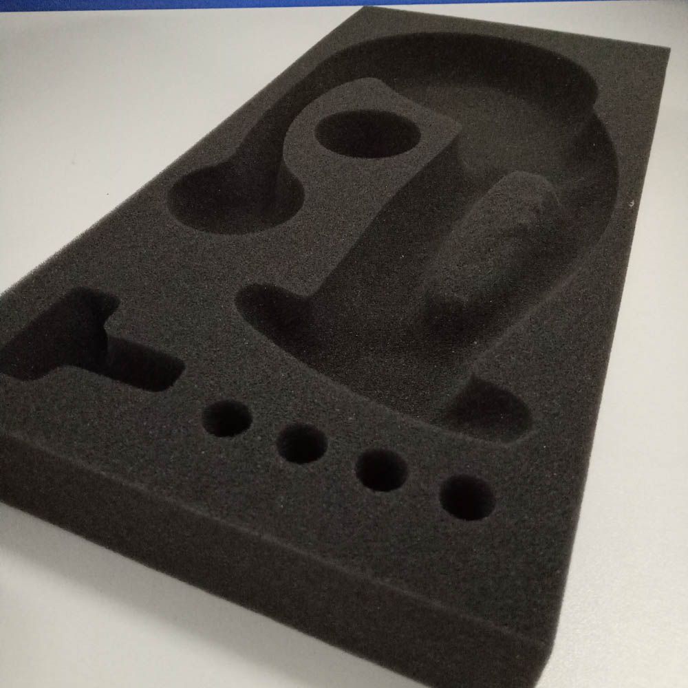 Open cell foam insert for packing